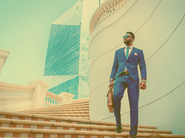 successful man on the background of beautiful architecture